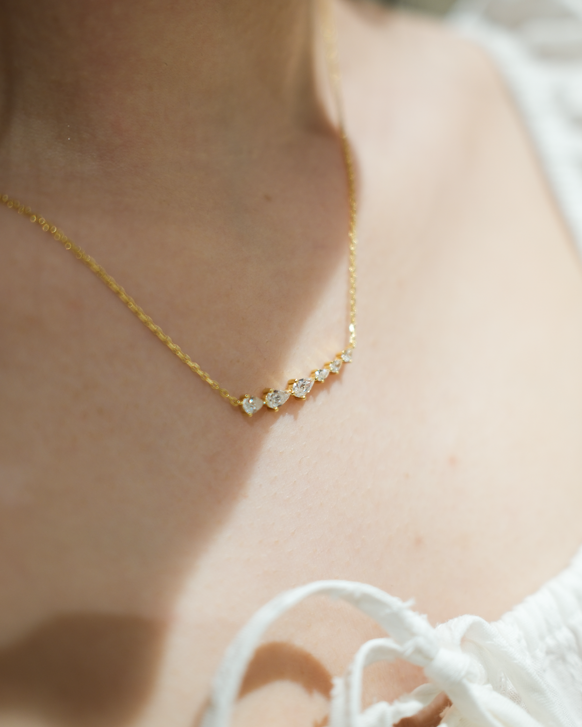 Bow Cascade Bar Necklace